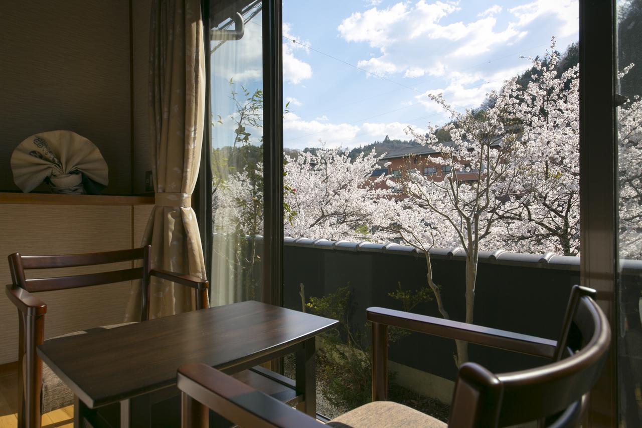 Kurotake Hotel Achi Exterior photo